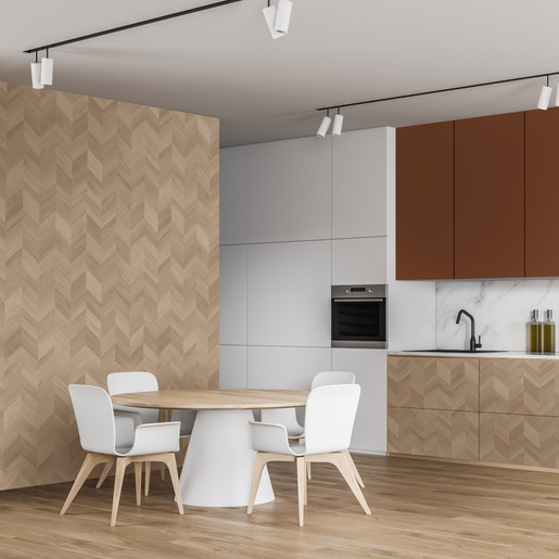 Corner of spacious kitchen and dining room with white marble and wooden walls, round table with chairs, wooden countertops and white cupboards. 3d rendering